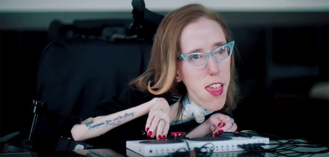 Videogame player Erin enjoys playing shooter games with the new Xbox One Adaptive Controller.